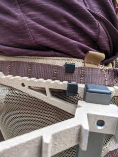 Climbing stick hanger by 3D Hunting Solutions, designed for securely holding climbing sticks in outdoor hunting setups.