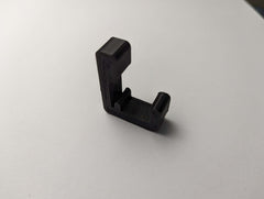 Climbing stick hanger from 3D Hunting Solutions, designed to securely hold climbing sticks for hunting or outdoor activities.