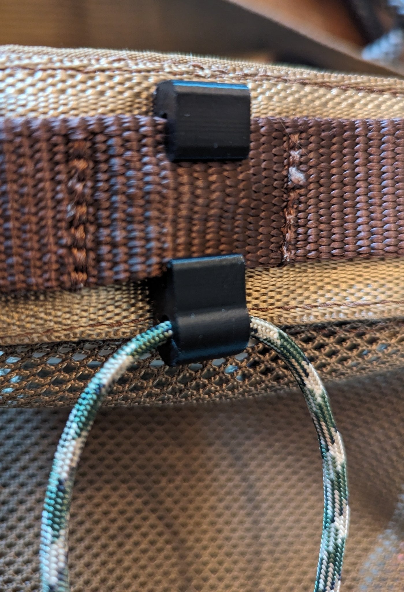 Rope Molle Hanger from 3D Hunting Solutions with durable rope and Molle attachment points for outdoor gear organization