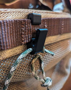Rope Molle hanger hook for saddle hunting by 3D Hunting Solutions, showing the durable metal hook attached to a rope for gear hanging.