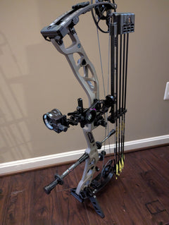 Split limb bow stand by 3D Hunting Solutions, showcasing a sturdy, portable bow holder designed for hunting and archery equipment.