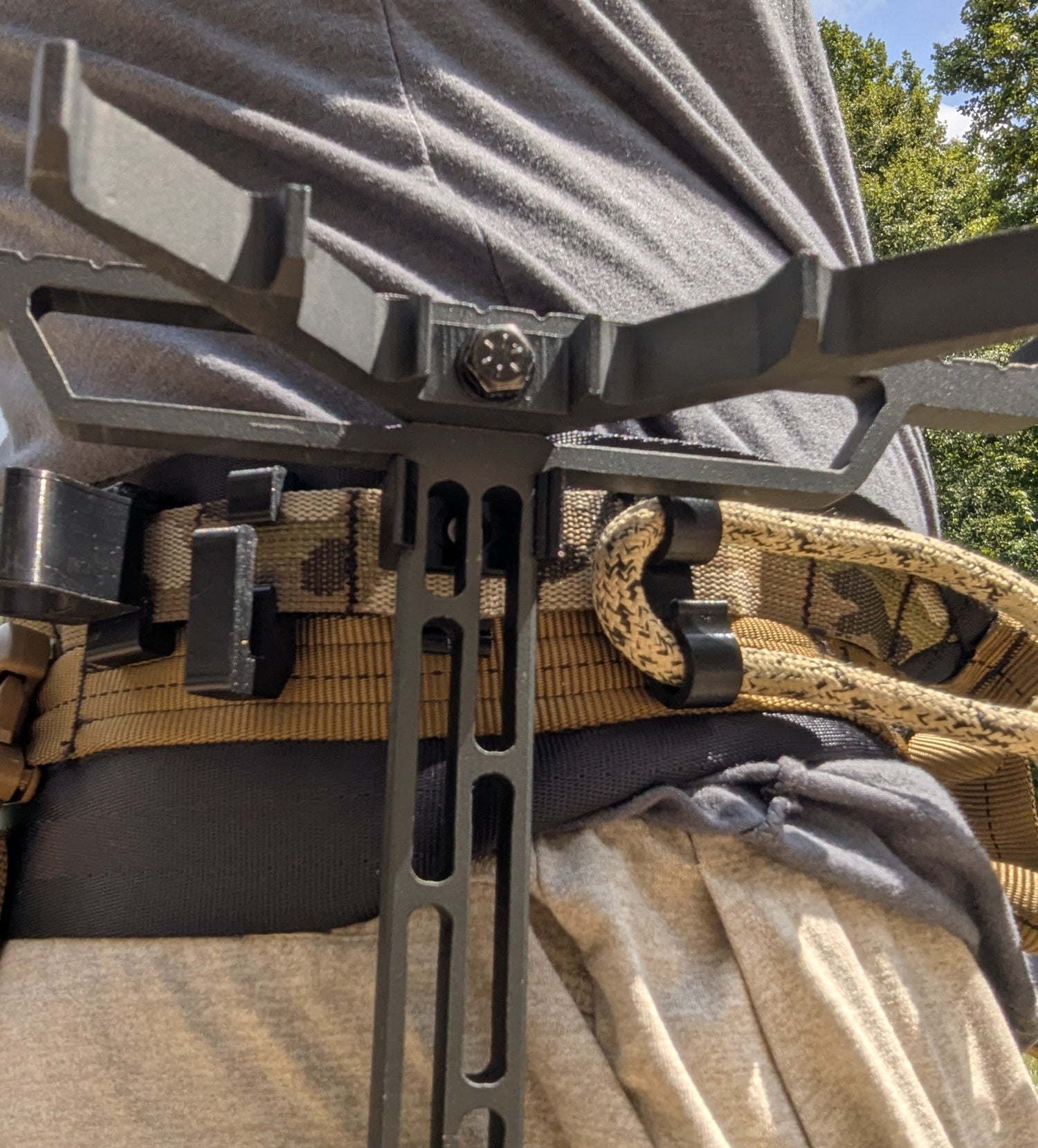 3D Hunting Solutions XOP Hydro Stick Caddy for saddle hunting, shown attached to a saddle for easy hydration storage.