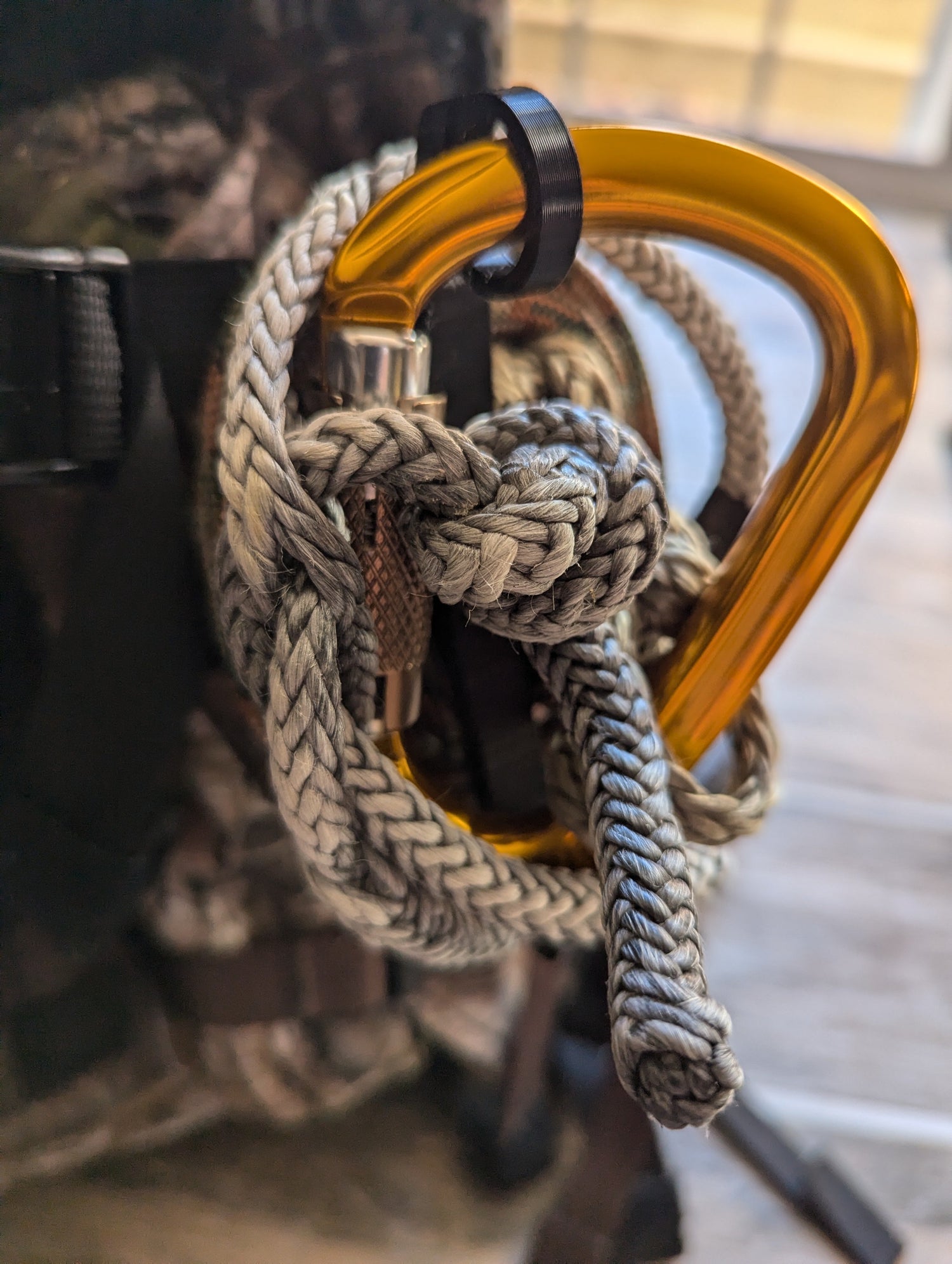 Multi spool rope keeper gear hoist by 3D Hunting Solutions for saddle hunting, shown in use with multiple ropes attached.