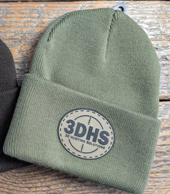 Brown 3DHS Crosshair Beanie hat by 3D Hunting Solutions, featuring a knitted design and crosshair logo for outdoor wear.