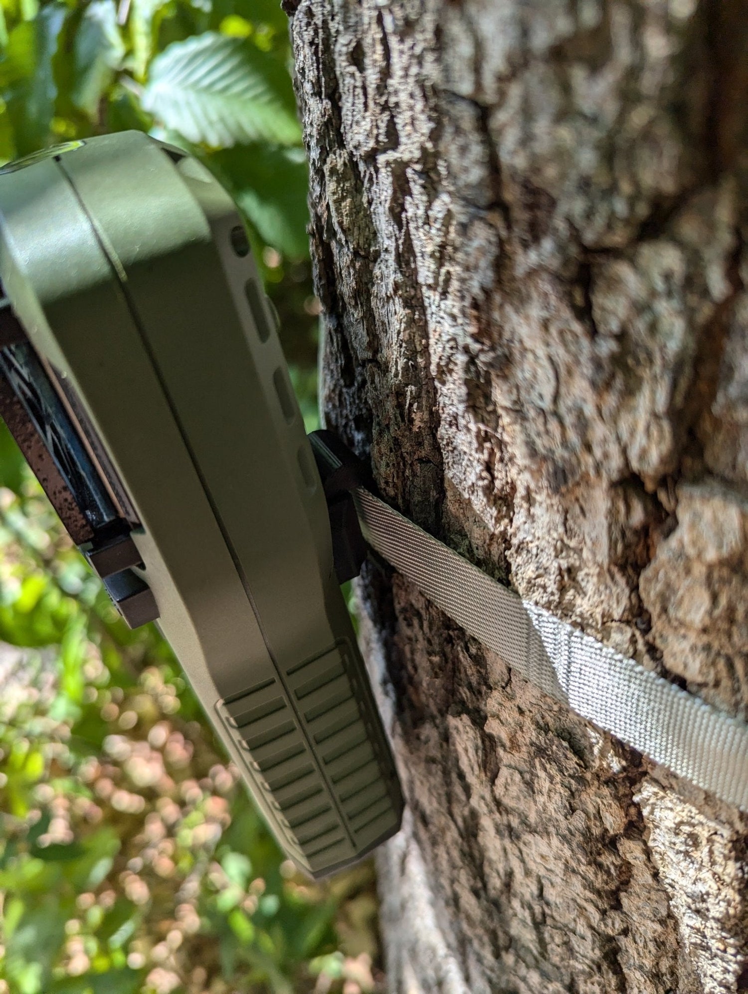 Thermacell Caddy Tree or Pack Mount hunting accessory by 3D Hunting Solutions, shown attached to a tree for outdoor use.