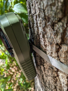 Thermacell Caddy Tree or Pack Mount hunting accessory by 3D Hunting Solutions, shown attached to a tree for outdoor use.