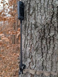 3D Hunting Solutions Blindside 360 Camera Mount attached to a tree for wildlife monitoring and outdoor filming.
