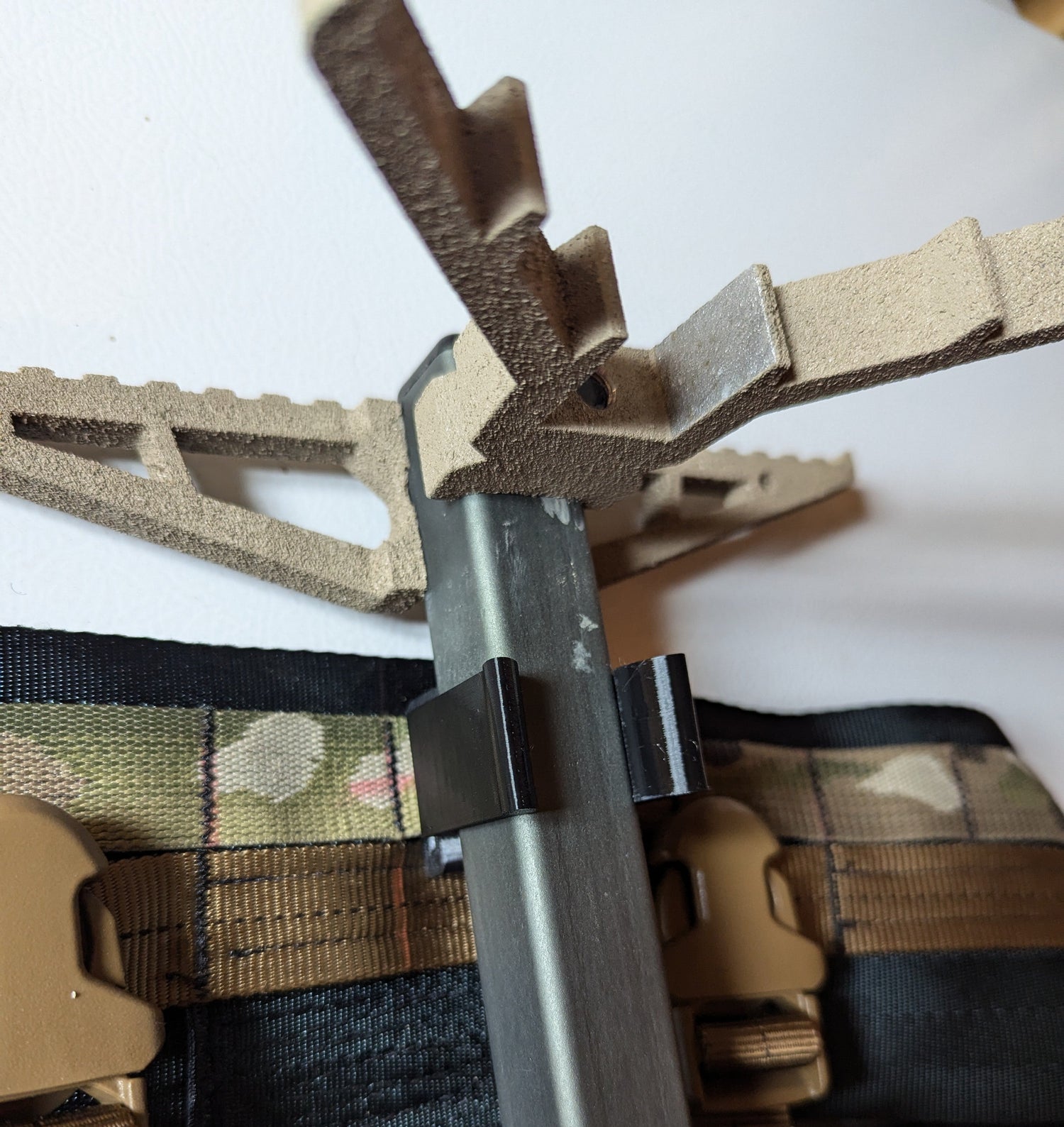 Climbing stick Molle caddy for 1-inch square tubing, designed for saddle hunting, by 3D Hunting Solutions.