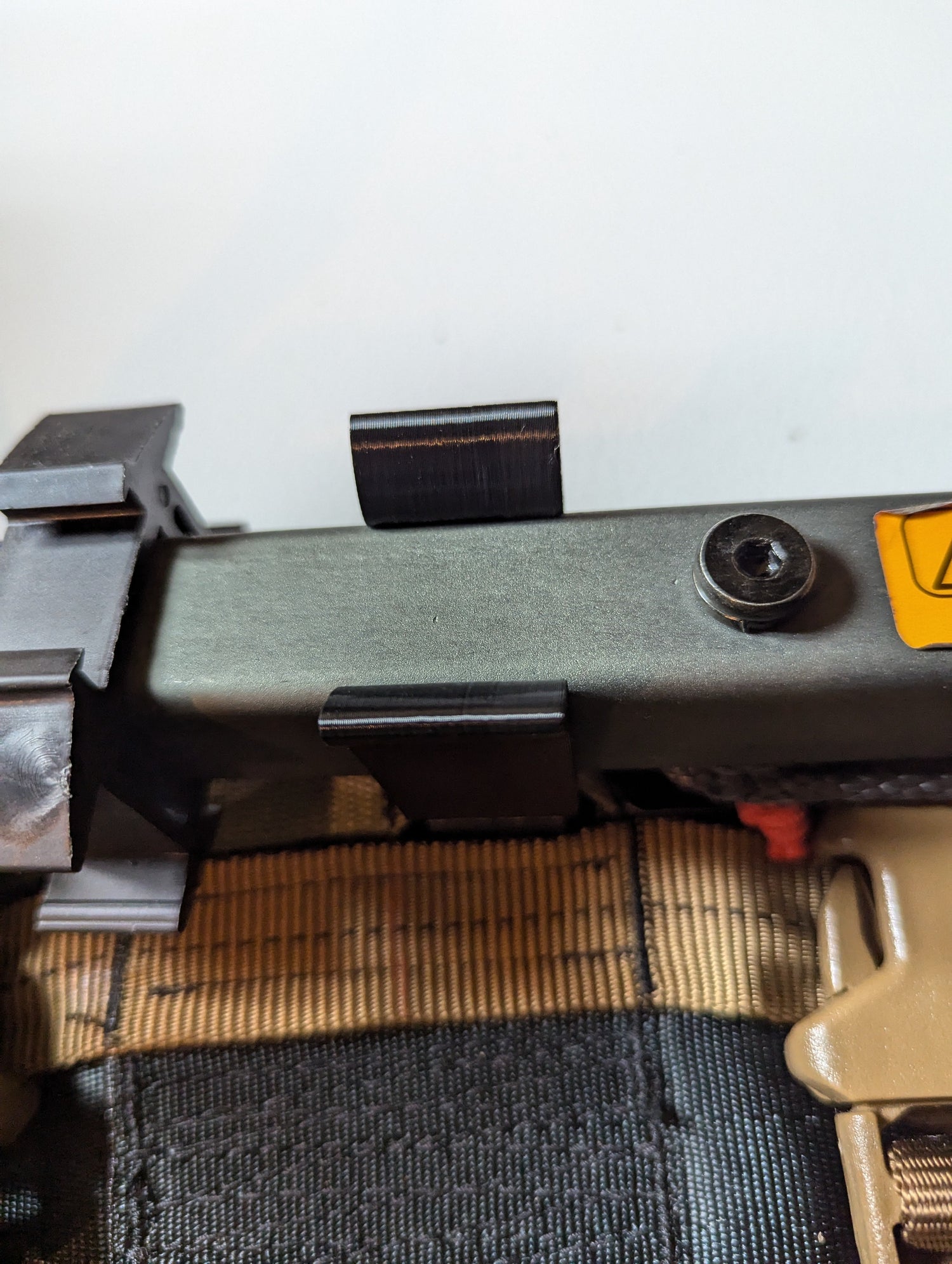 Vertical climbing stick Molle caddy for 1-inch square tubing, designed for saddle hunting, by 3D Hunting Solutions.