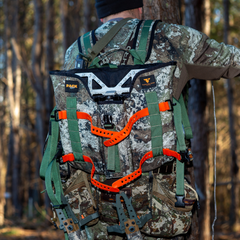 Twisted Iron Hunting Strata Pack Rat DLX in camouflage with adjustable straps and multiple compartments for outdoor gear storage.