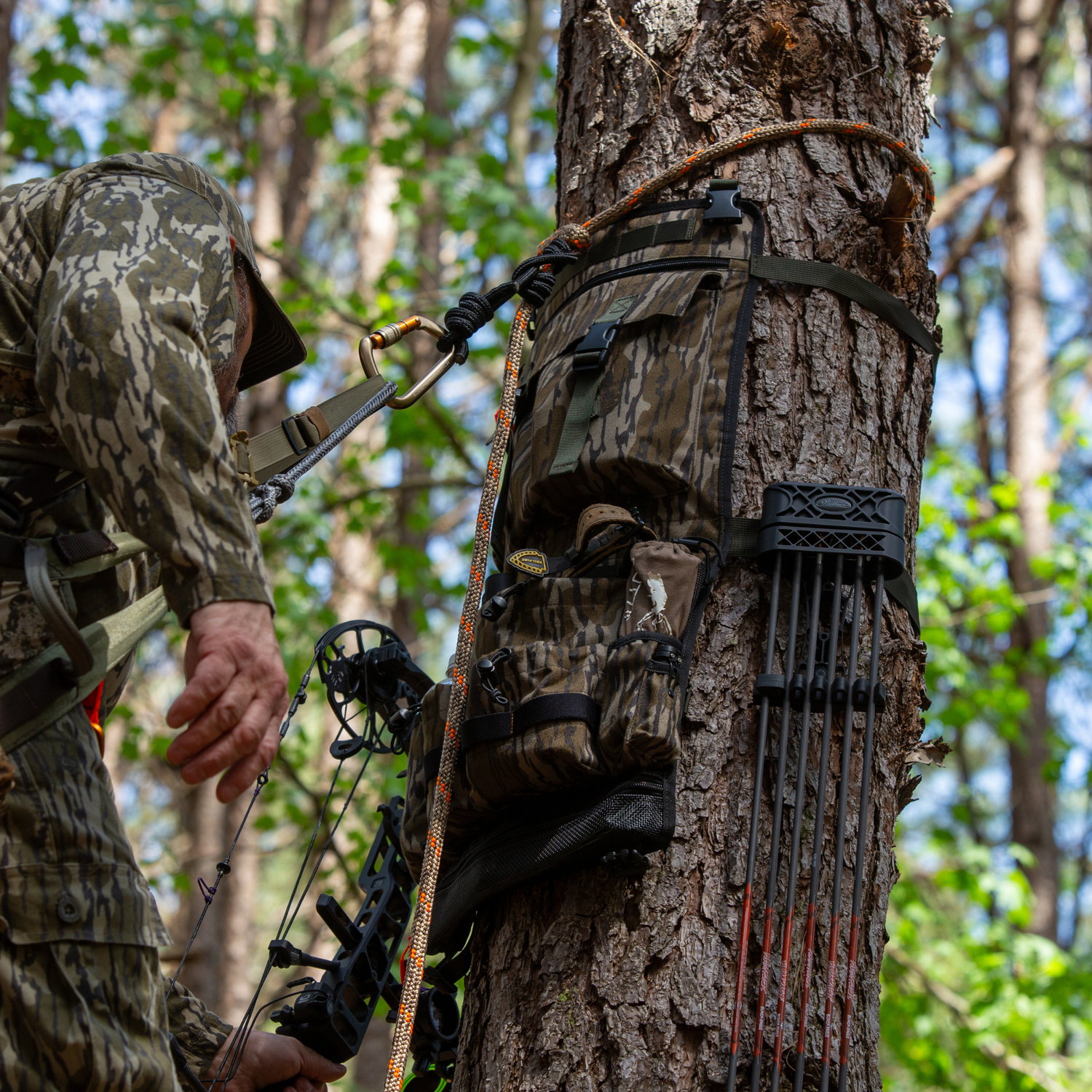 Twisted Iron Hunting Tree Hugger in regular or mini size, showing a durable tree stand with sturdy straps for outdoor hunting.