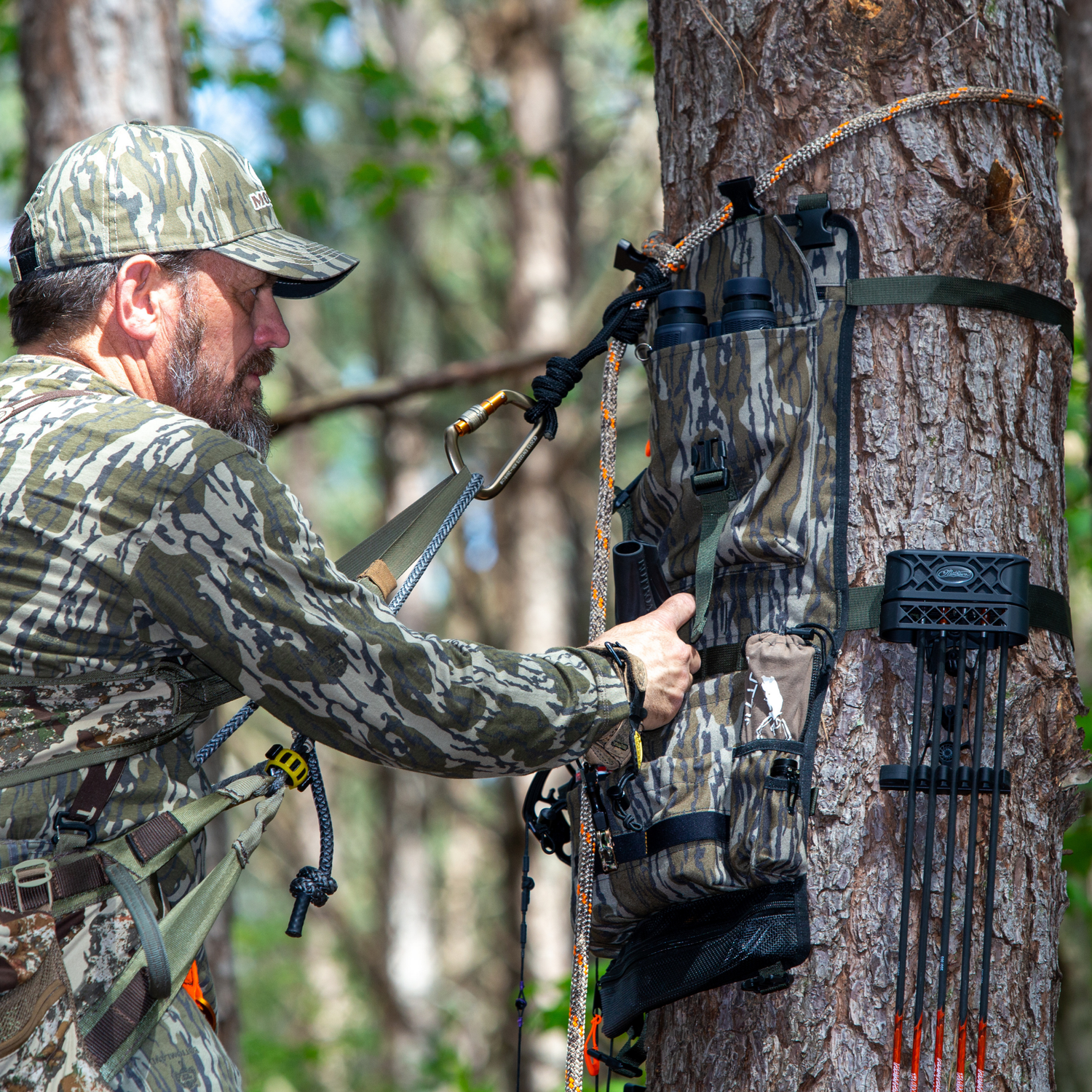 Twisted Iron Hunting Tree Hugger in regular or mini size, showing a sturdy, eco-friendly tree stand with a camo finish.