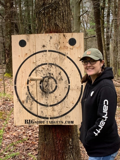 Bigshot Archery wooden axe throwing target with built-in bottle opener for outdoor games and recreational activities.