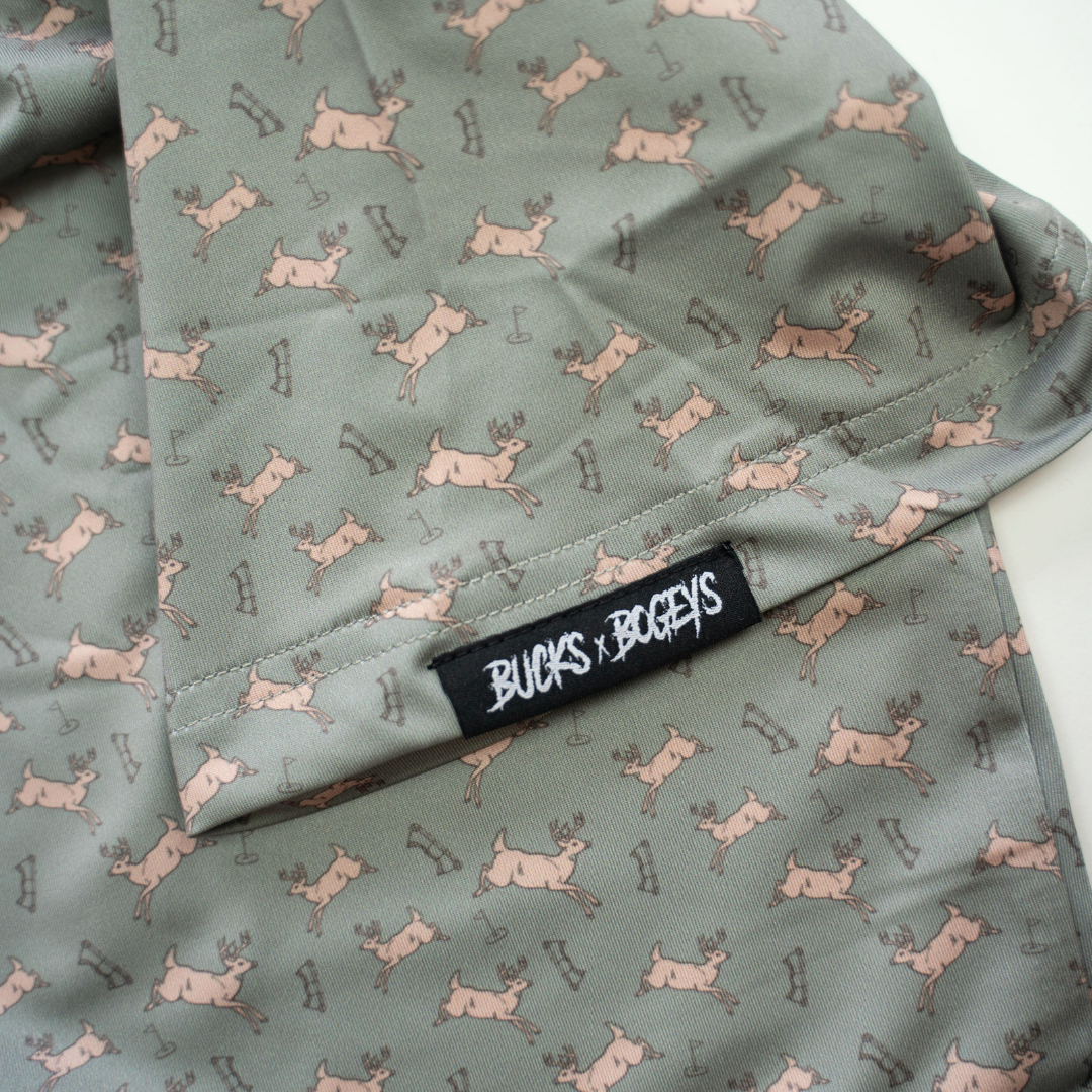 Bow Crew Apparel Bows & Bucks golf polo shirt featuring bow hunting and buck graphics, casual T-shirt for outdoor enthusiasts.