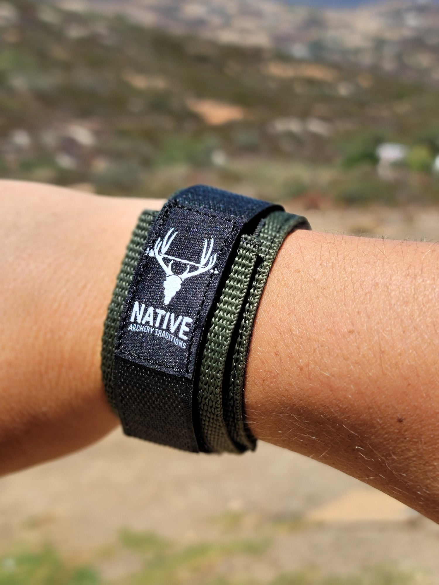 Black Native Archery Release Strap by Bow Disciples, adjustable strap with buckle for secure bowstring release.