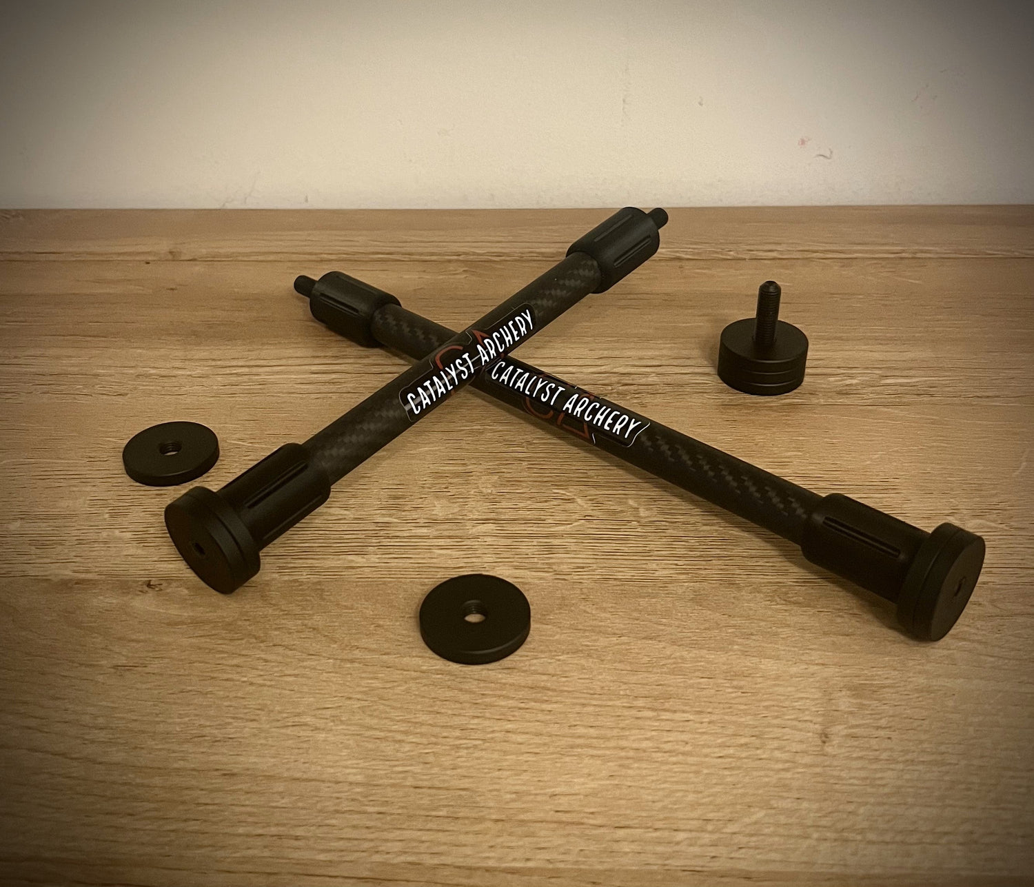 Catalyst Archery bow hunting stabilizer set with 8-inch and 6-inch stabilizers for improved balance and accuracy.
