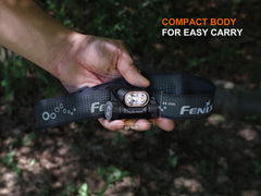 Fenix HM55R lightweight multi-LED headlamp with adjustable strap and bright beam, black color, for outdoor and work use.