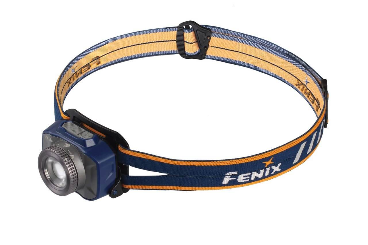 Blue Fenix HL40R rechargeable LED headlamp with focusable beam and USB charging, designed for outdoor and hands-free lighting.