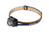 Blue Fenix HL40R rechargeable LED headlamp with adjustable focus and USB charging, designed for outdoor and camping activities.