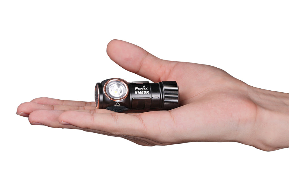 Fenix HM50R V2.0 LED headlamp with 700 lumens, adjustable head strap, and compact design for outdoor activities.