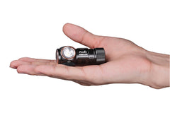 Fenix HM50R V2.0 LED headlamp with 700 lumens, adjustable head strap, and compact design for outdoor activities.