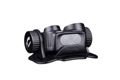 Fenix HM65R rechargeable LED headlamp with 1400 lumens showing the adjustable head strap and bright front light in use