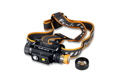 Fenix HM70R rechargeable LED headlamp with 1600 lumens, black headband, and adjustable straps for outdoor activities.