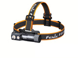 Fenix HM71R rechargeable industrial LED headlamp with adjustable straps and bright beam for outdoor and work use.