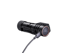 Fenix HM71R rechargeable industrial LED headlamp with adjustable strap and bright beam, designed for hands-free lighting use.