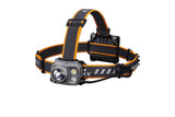 Fenix HP16R rechargeable headlamp emitting bright 1250 lumens, with adjustable strap and high-performance LED light.