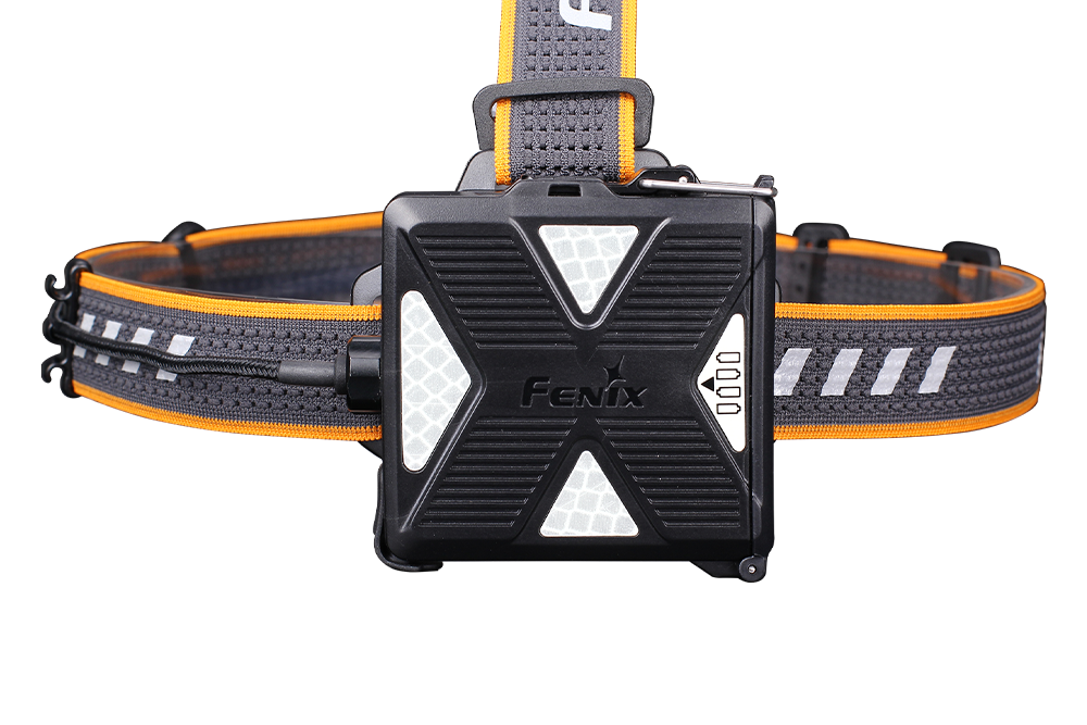 Fenix HP16R rechargeable headlamp with 1250 lumens, black headlamp with adjustable straps and LED light on the front.