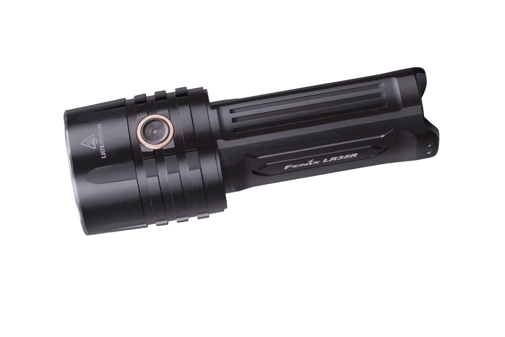 Fenix LR35R rechargeable LED flashlight with 10,000 lumens, black body, turned on beam illuminating a dark area.