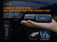 Fenix LR35R rechargeable LED flashlight emitting a bright beam, compact design, with a black body and textured grip.