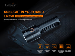 Fenix LR35R rechargeable LED flashlight emitting a bright beam, with a black body and textured grip, 10,000 lumens.