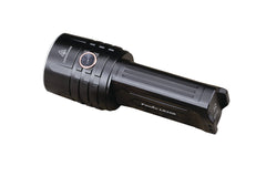 Fenix LR35R rechargeable LED flashlight emitting bright beam, showcasing its compact design and high lumen output.