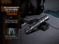Fenix PD35R compact rechargeable tactical flashlight with black body and adjustable beam, designed for outdoor and tactical use.