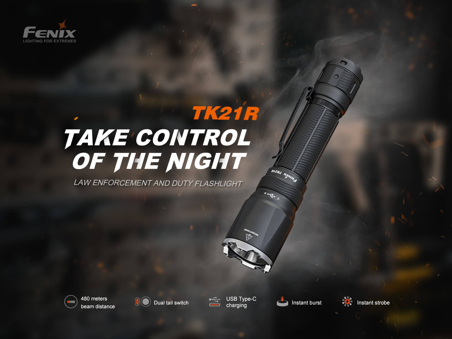 Black Fenix TK21R tactical duty flashlight with textured grip and high lumen LED for outdoor and professional use.