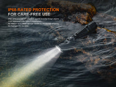Black Fenix TK21R tactical duty flashlight with textured grip and adjustable beam, designed for high-performance illumination.