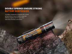 Fenix PD32R rechargeable tactical flashlight with silent switch, black body, and LED light, designed for outdoor and tactical use.