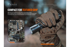 Fenix TK20R V2.0 rechargeable tactical flashlight with black body and textured grip, includes optional T5 tactical pen.
