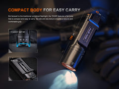 Fenix TK35R rechargeable tactical flashlight with UV output, black body, textured grip, and LED lens on a neutral background.