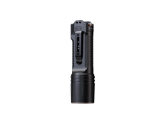Fenix TK35R rechargeable tactical flashlight with UV light, black body, textured grip, and adjustable focus.