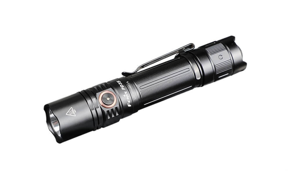 Fenix PD35 V3.0 tactical flashight in tropic green with 1700 lumens, compact design for everyday carry and outdoor use