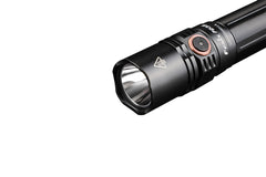 Fenix PD35 V3.0 tactical flashlight in tropic green, showing its compact design and LED lens for everyday carry use.