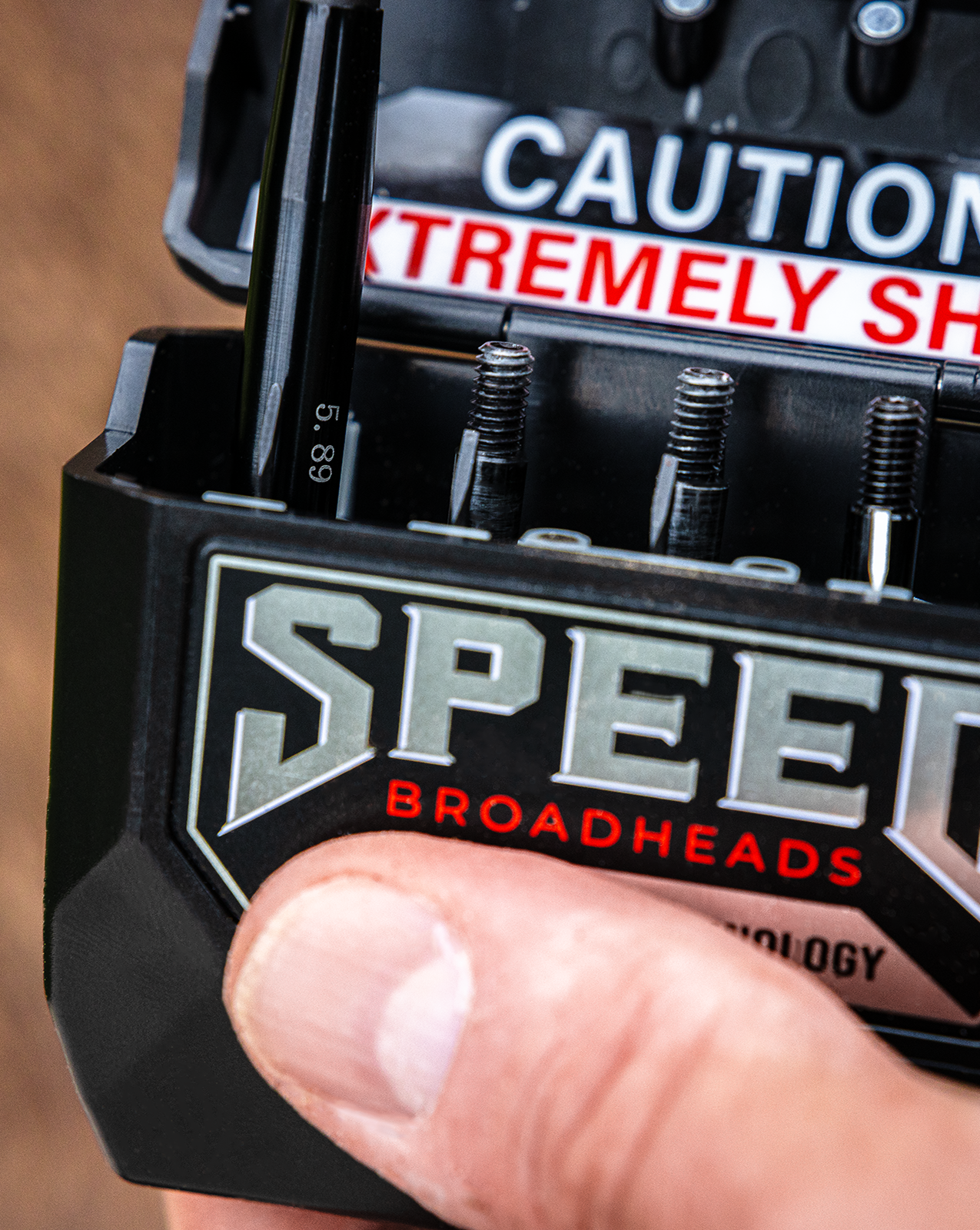 Speed Broadheads Speed Broadhead Case showing durable black storage case with multiple compartments for arrowheads and accessories