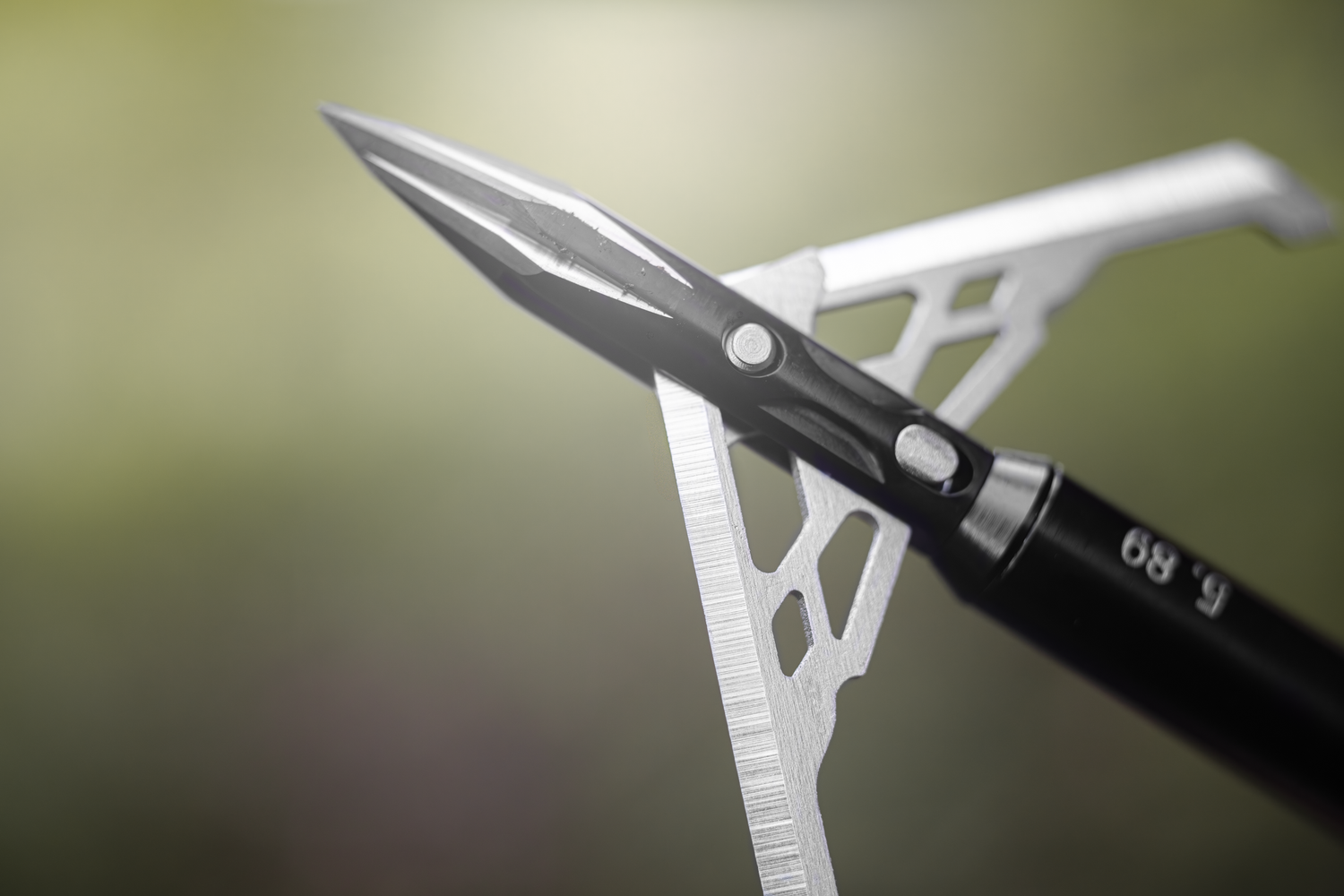 Speed Broadheads Titanium 100 broadhead with sleek titanium construction, sharp blades, and aerodynamic design for hunting.