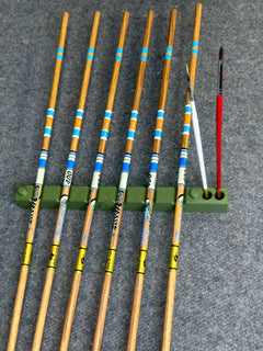 Vantage Point Archery Crest Rest in tan for stabilizing arrows on compound bows, shown mounted on a bow riser.
